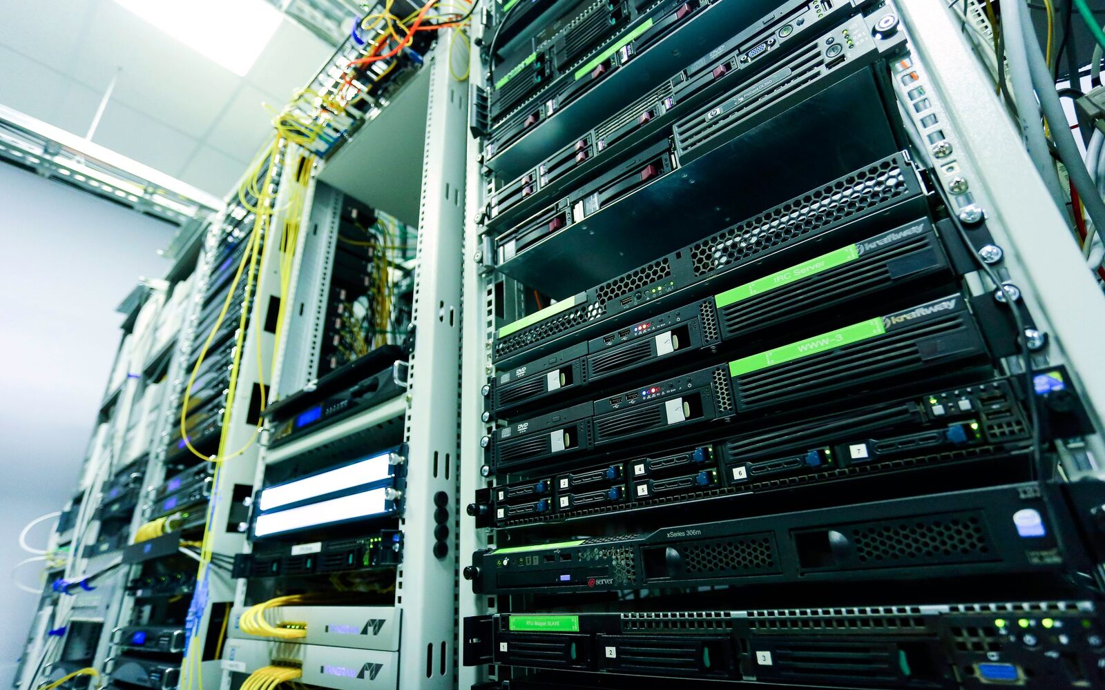 An aisle of server racks in a data centre
